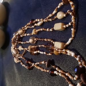 46 inches of glass and Wooden bead necklaces.